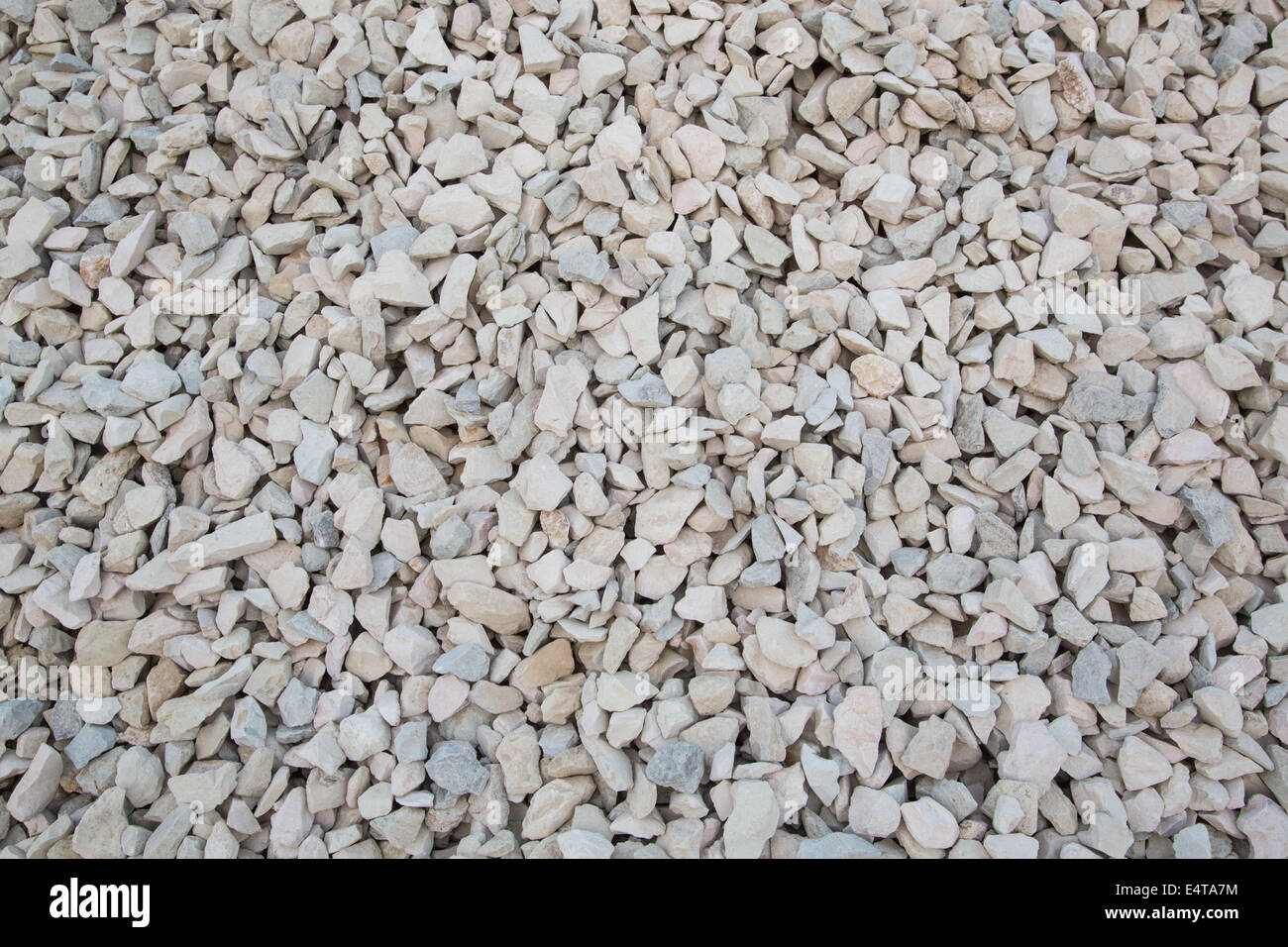 Small gravel of light grey color.Background Stock Photo - Alamy