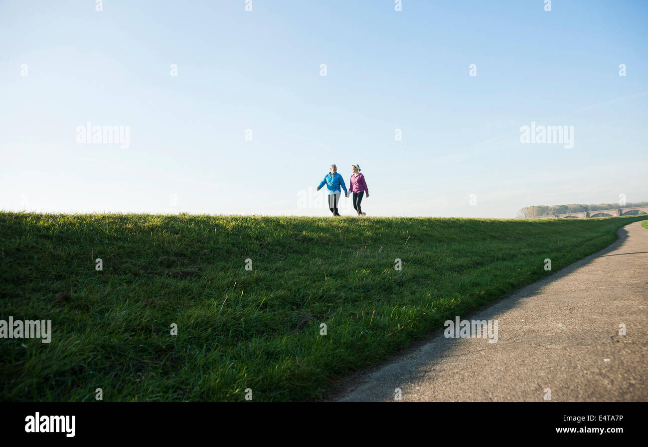 Couple Walking Outdoors, Mannheim, Baden-Wurttemberg, Germany Stock Photo