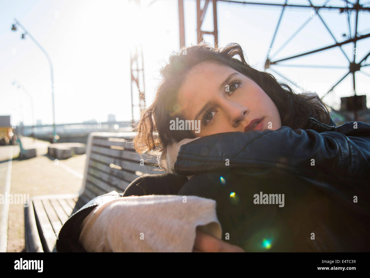 Teen girl sitting knees up hi-res stock photography and images - Alamy