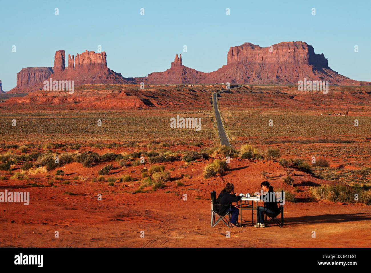 Family having breakfast beside U.S. Route 163, Monument Valley, Navajo Nation, Utah, near Arizona Border, USA Stock Photo