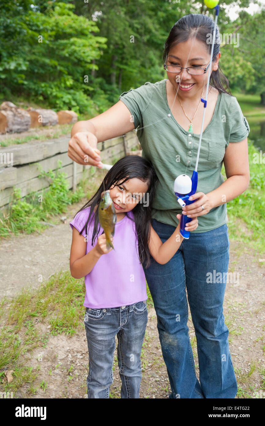 Mother and Daughter Showing off Freshly Caught Fish, Lake Fairfax ...
