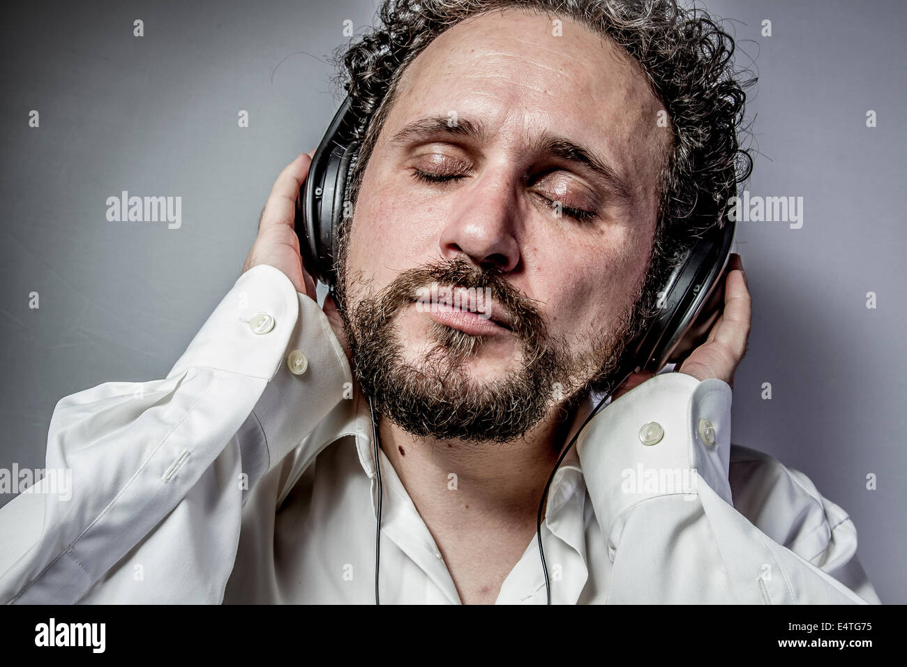 classical music, man with intense expression, white shirt Stock Photo