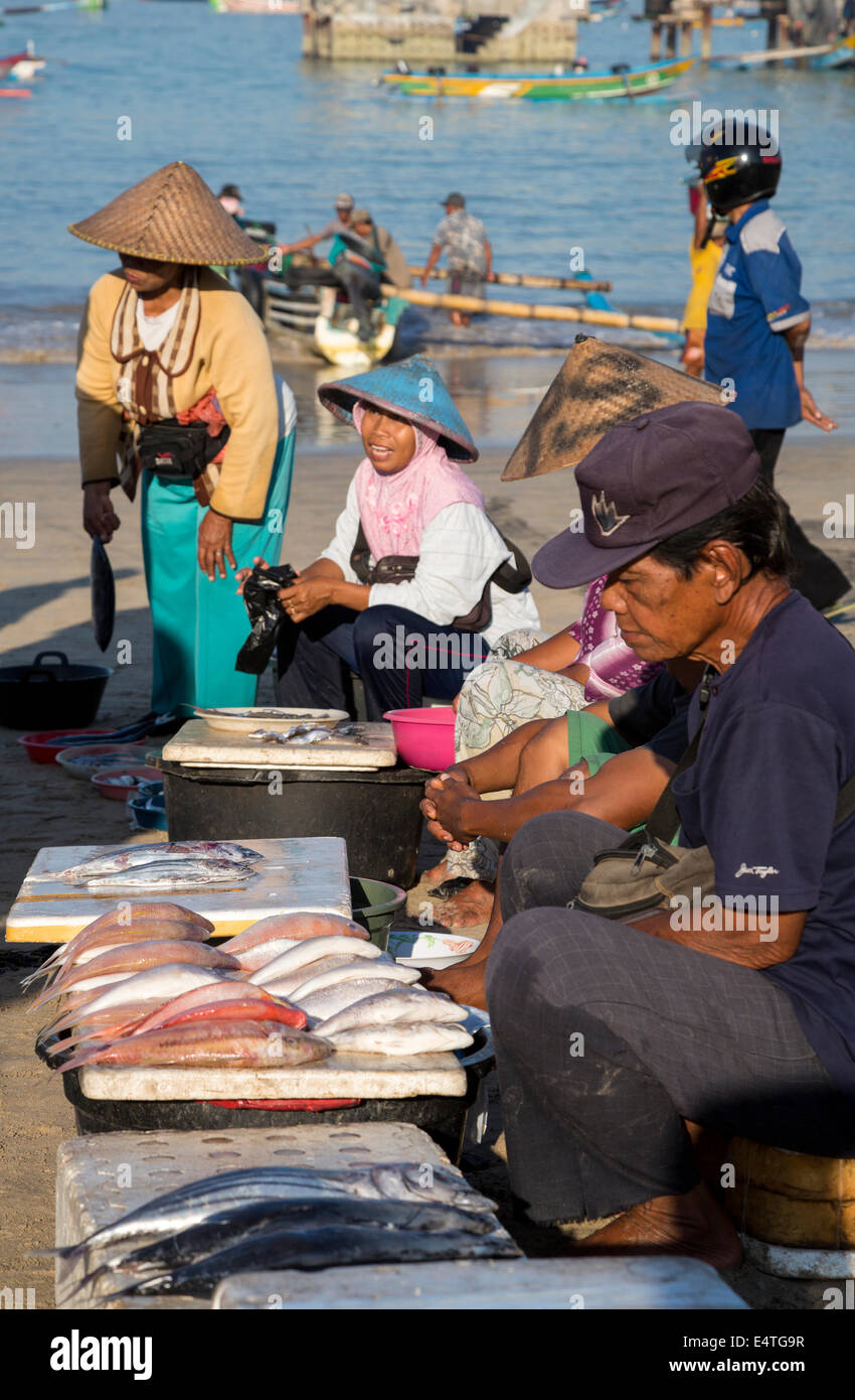 Jimbaran Beach, Bali, Indonesia.  Selling Fish on the Beach, early Morning. Stock Photo