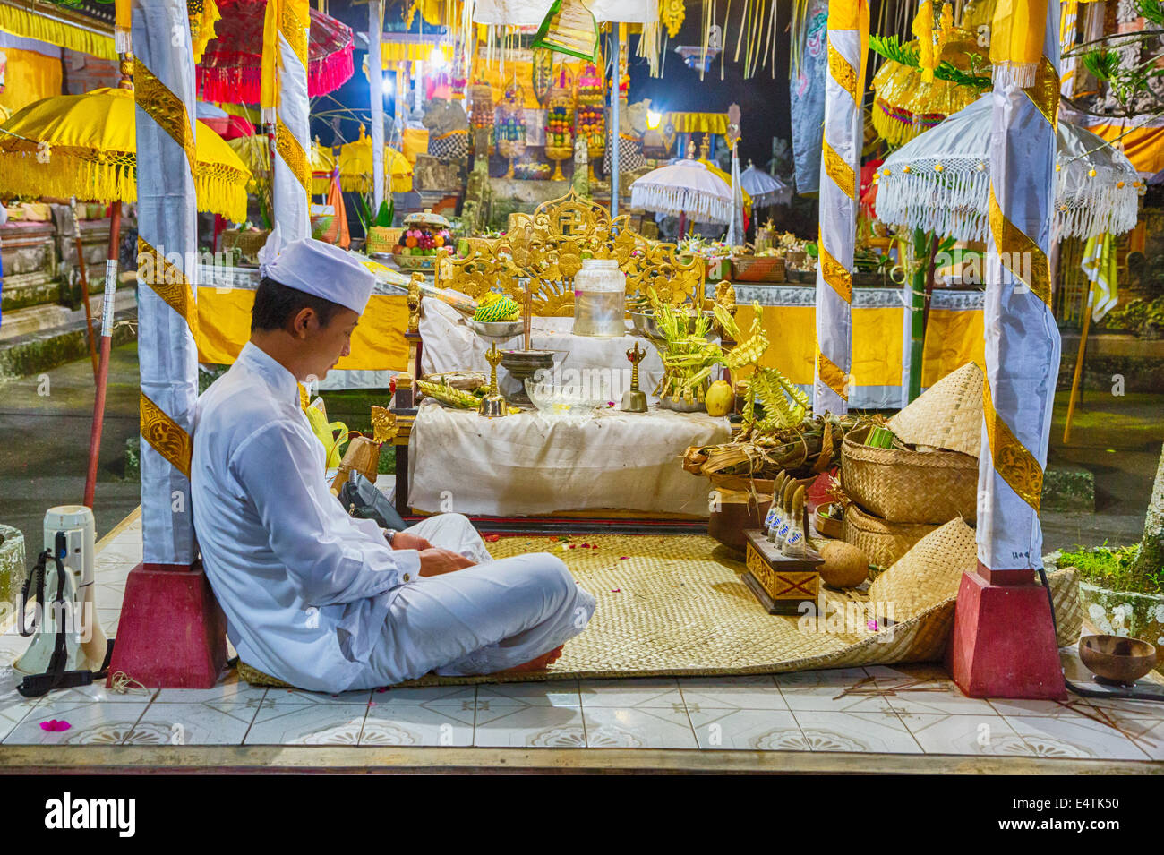 Bali, Indonesia.  Young Hindu Priest in Contemplation.  Pura Dalem Temple, Dlod Blungbang Village. Stock Photo