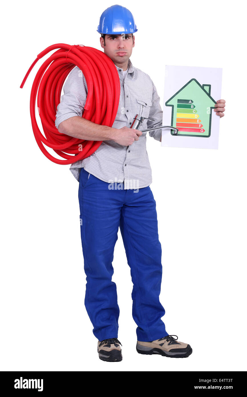 Electrician holding energy rating placard Stock Photo