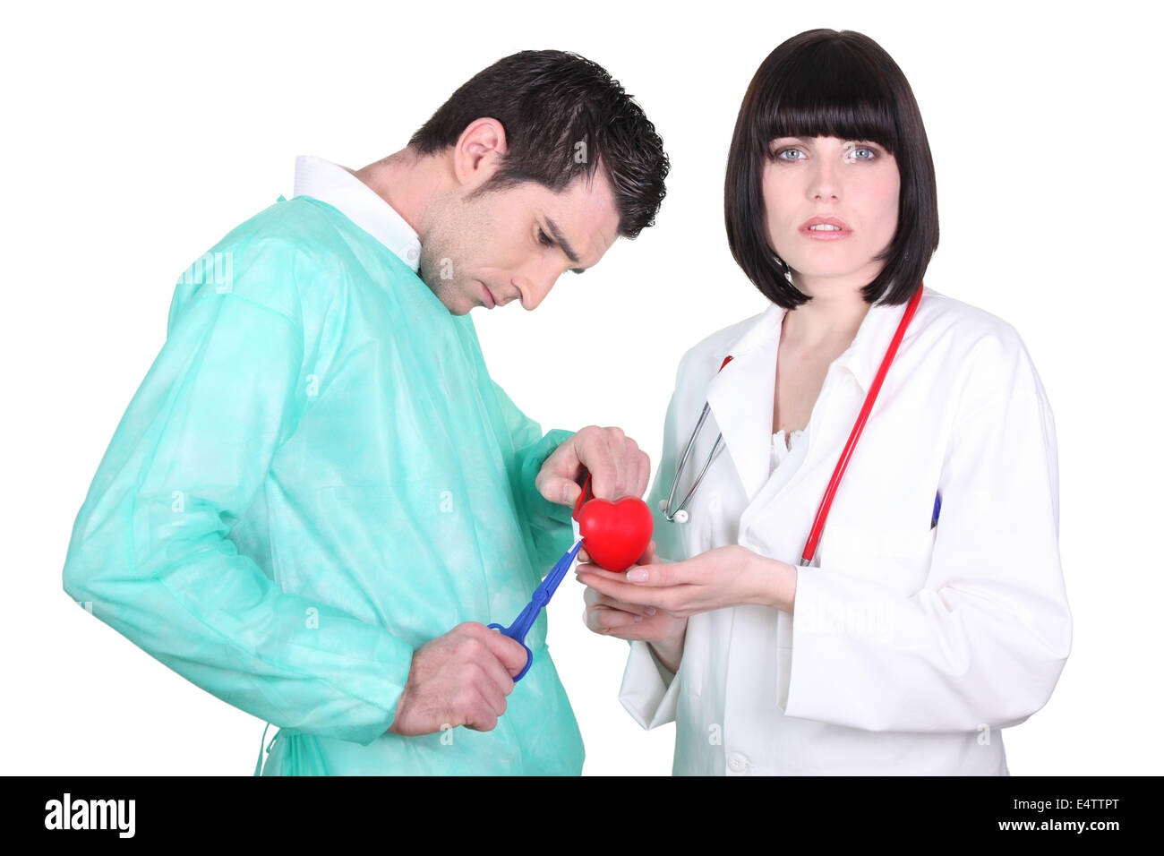 Doctors performing open heart surgery Stock Photo