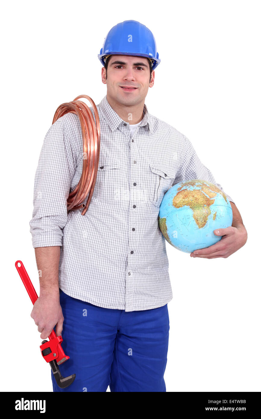 Tradesman holding a globe Stock Photo