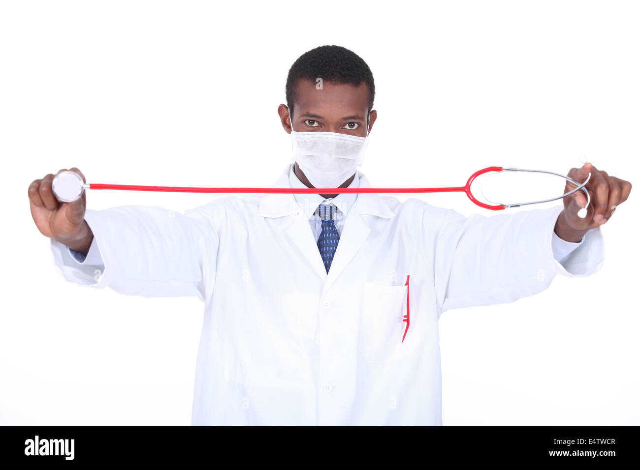 Doctor stretching stethoscope Stock Photo