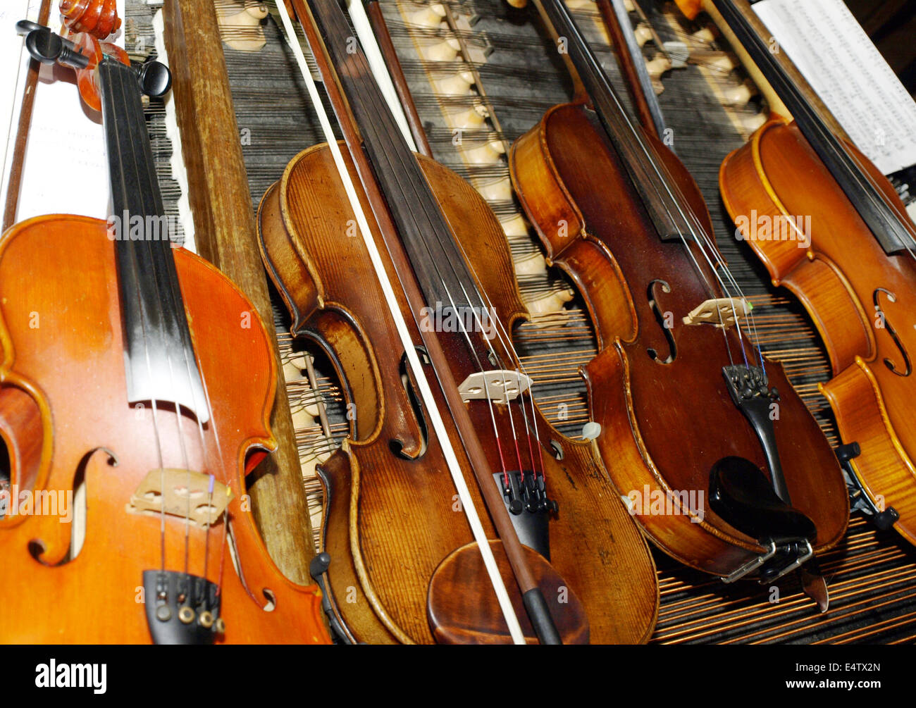 four violins Stock Photo