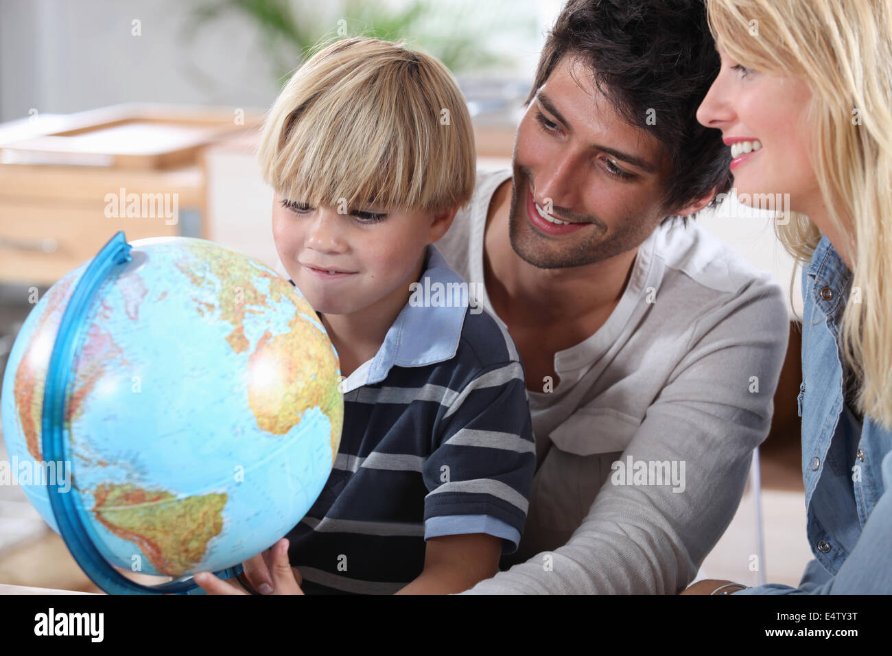 Parents at school with their child Stock Photo