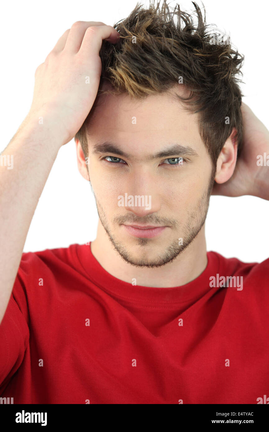 Man applying product to style hair Stock Photo Alamy