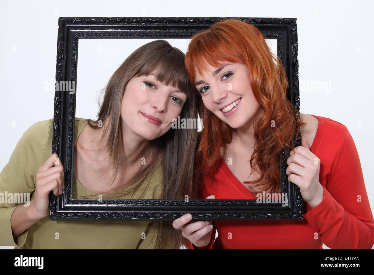 Women posed in a frame Stock Photo