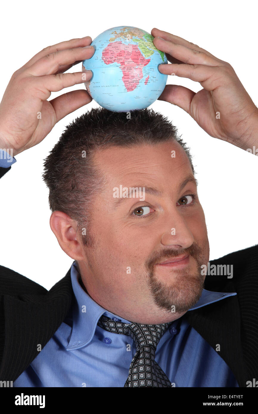 Businessman with a globe on his head Stock Photo - Alamy
