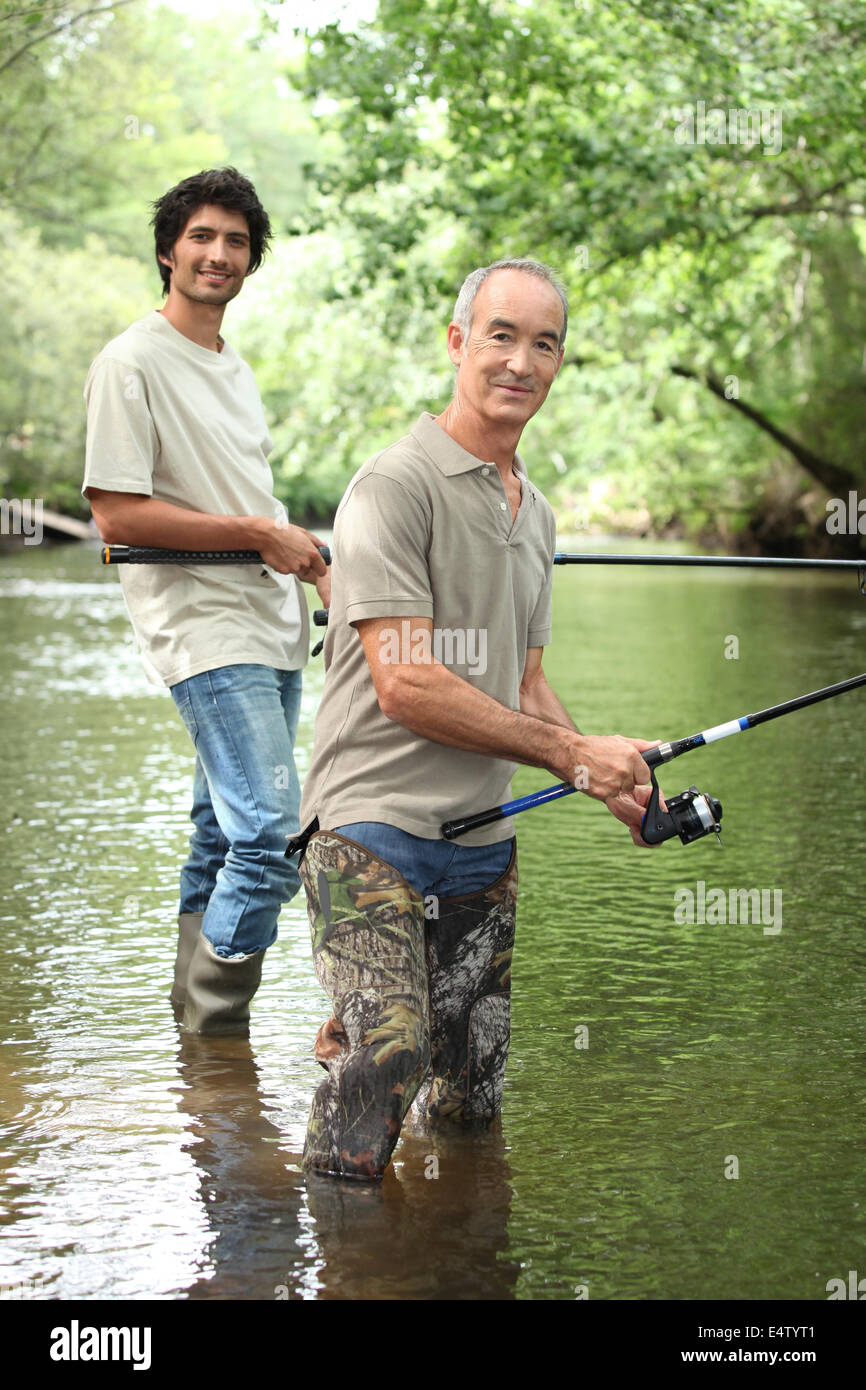senior and junior angling Stock Photo