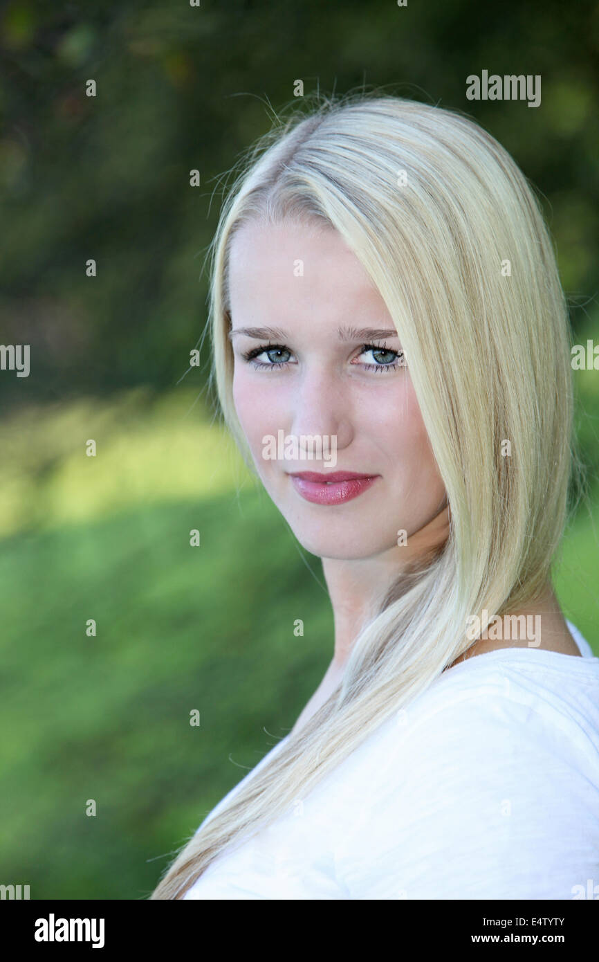 Serious beautiful teenage woman Stock Photo - Alamy