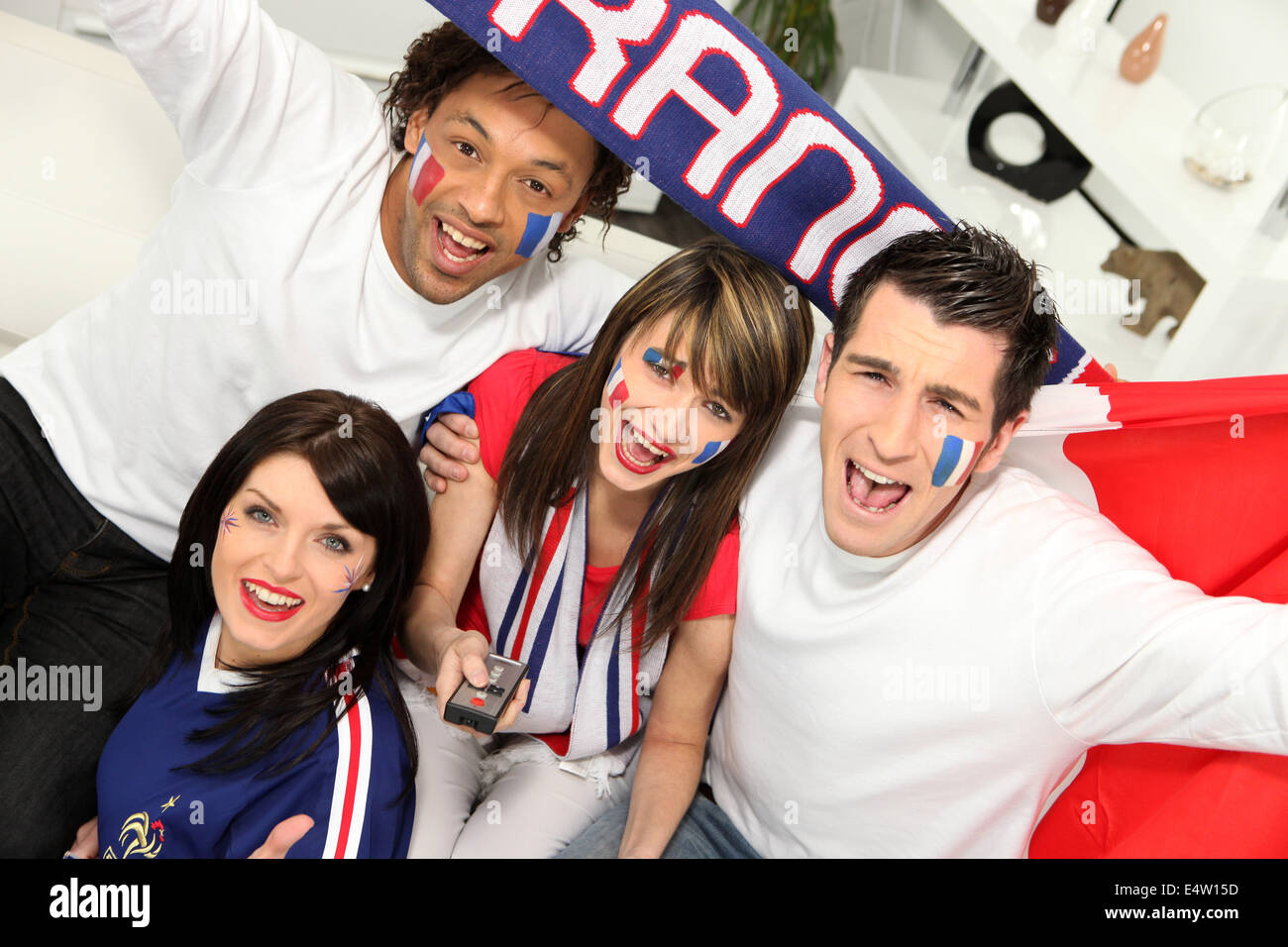 Young people supporting French sports team Stock Photo