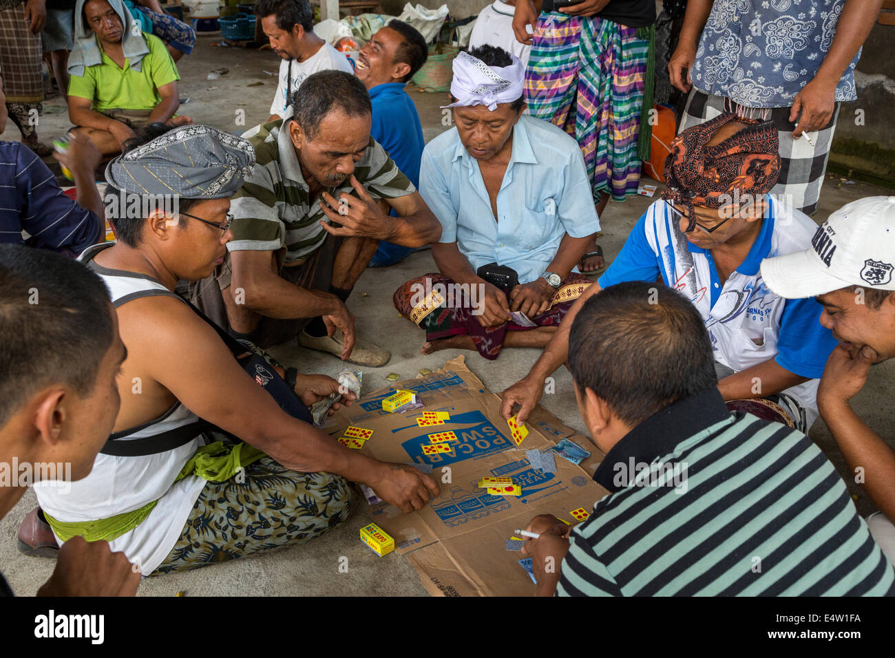 Bali, Indonesia. Gambling with Dominoes.  Dlod Blungbang Village. Stock Photo