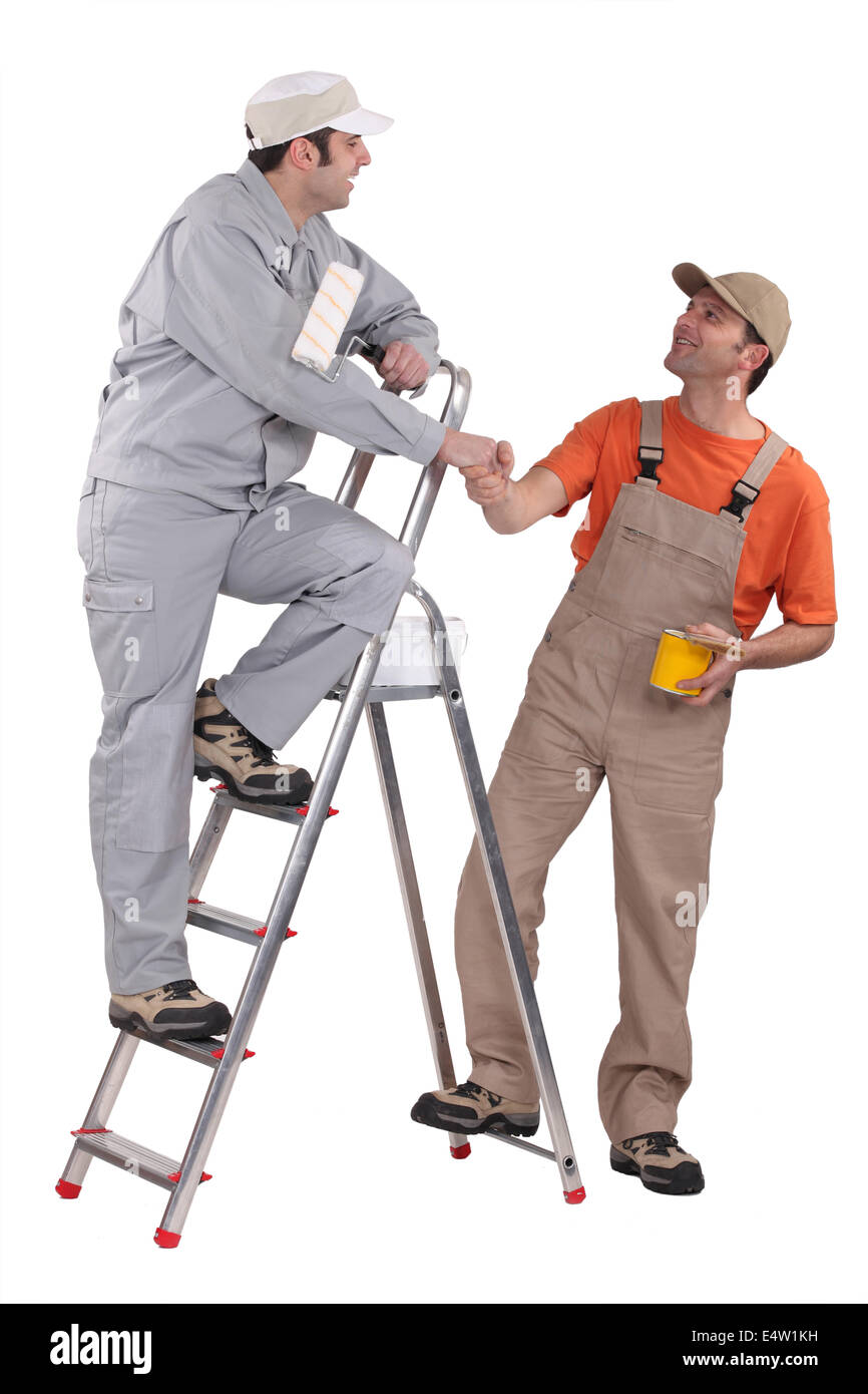 Two decorators working together Stock Photo