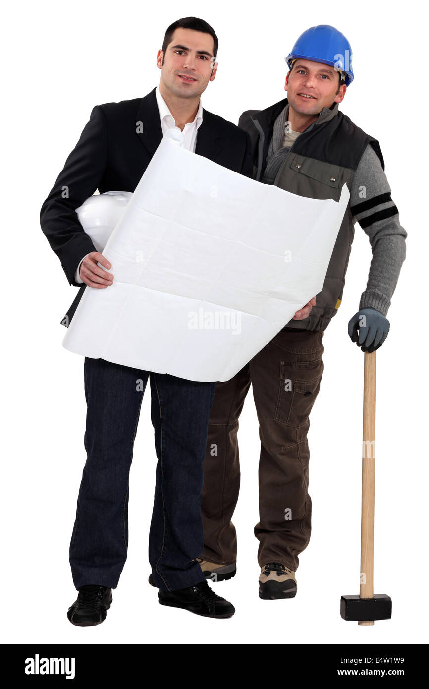 Tradesman and engineer working together Stock Photo