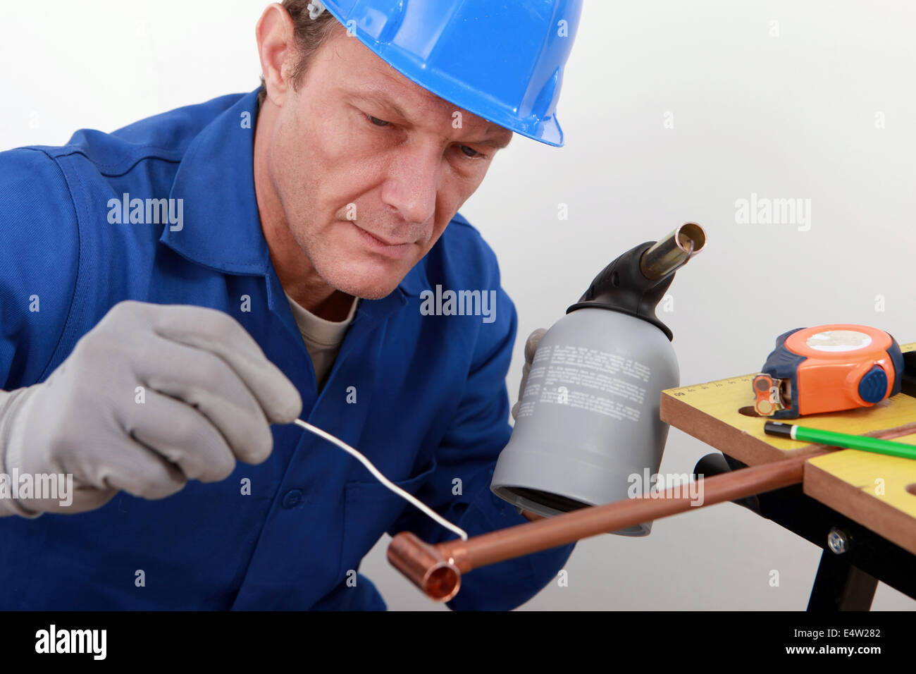 craftsman working with a welding torch Stock Photo
