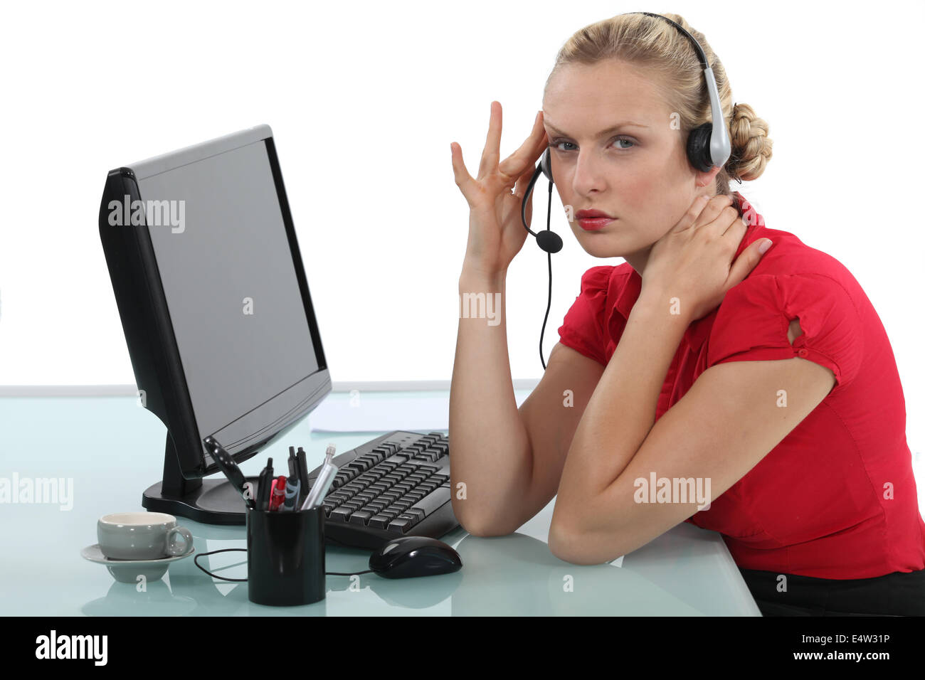 Stressed call-center worker Stock Photo - Alamy
