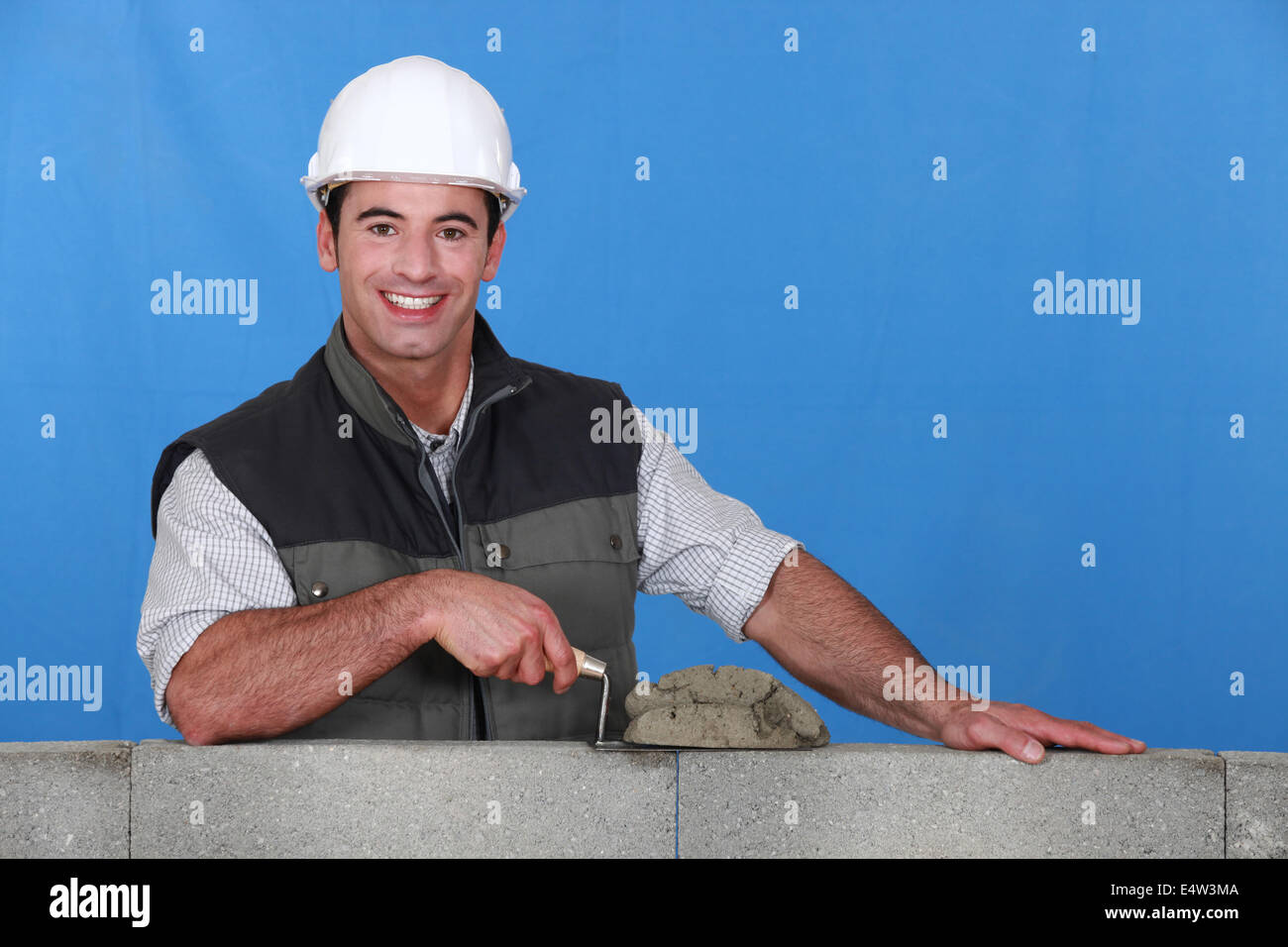Man laying bricks Stock Photo