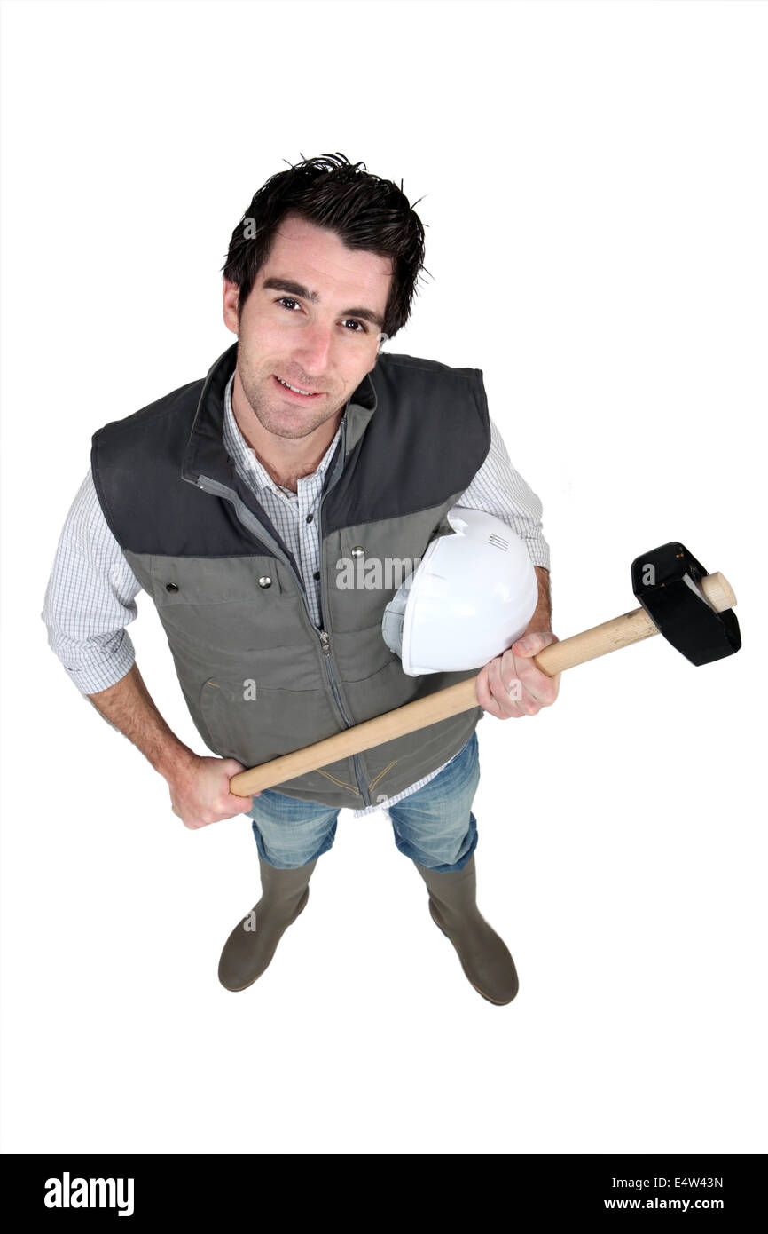 Tradesman holding a mallet Stock Photo