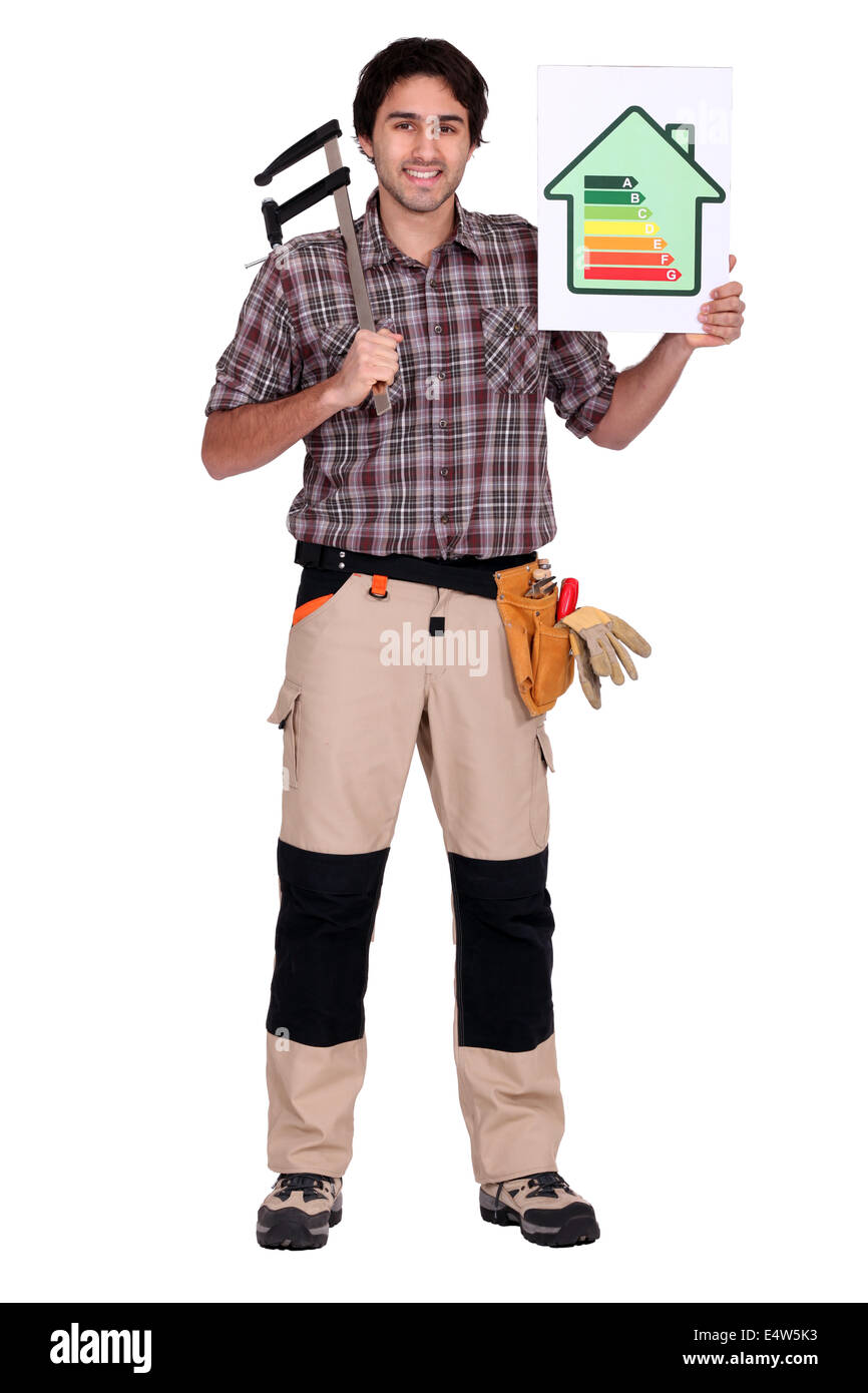 Man holding caliper and energy rating poster Stock Photo