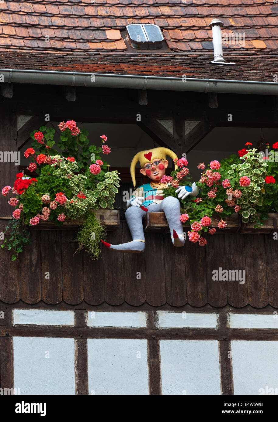 Clown toy on the window Stock Photo