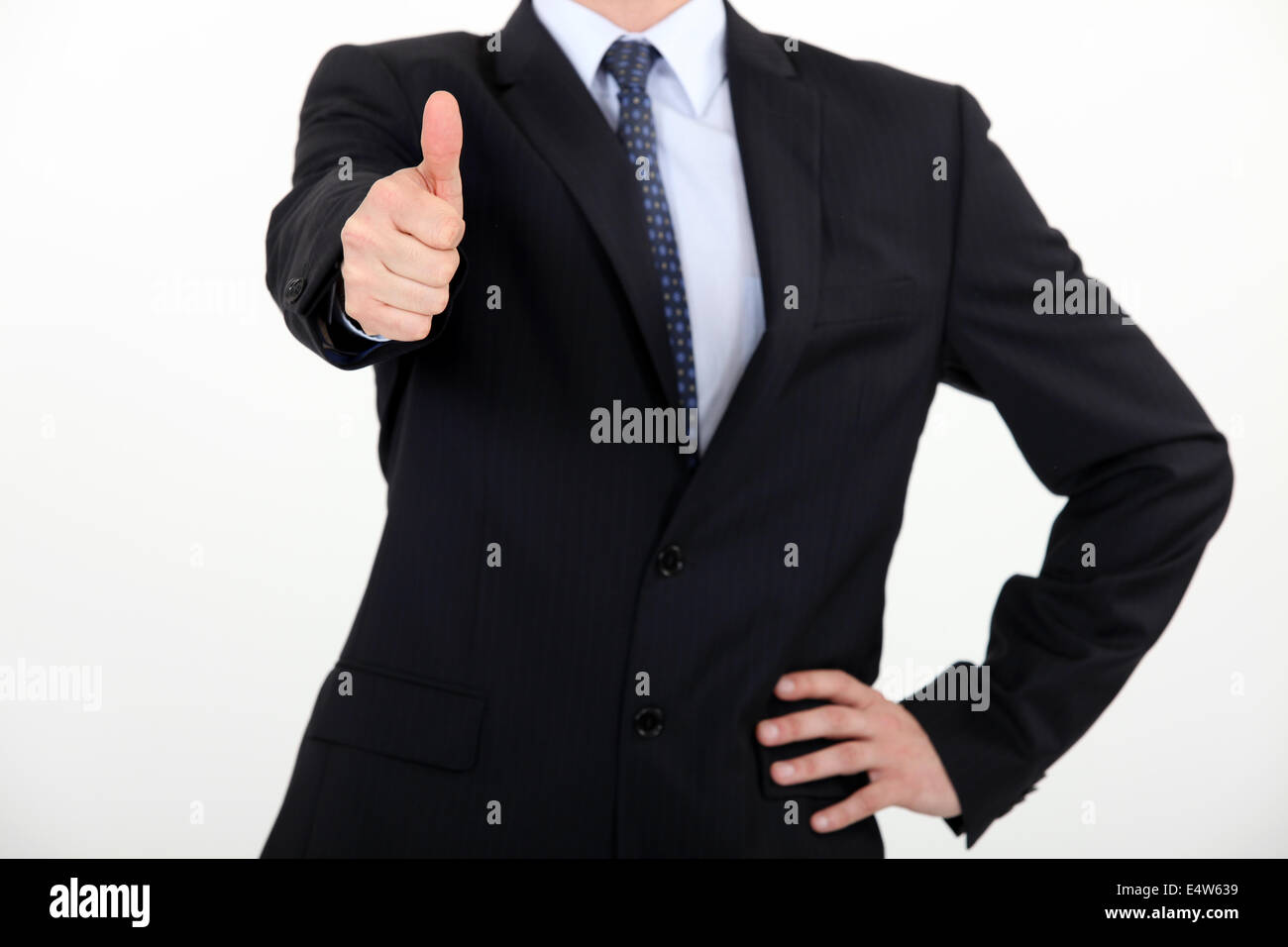 businessman making a thumbs up sign Stock Photo
