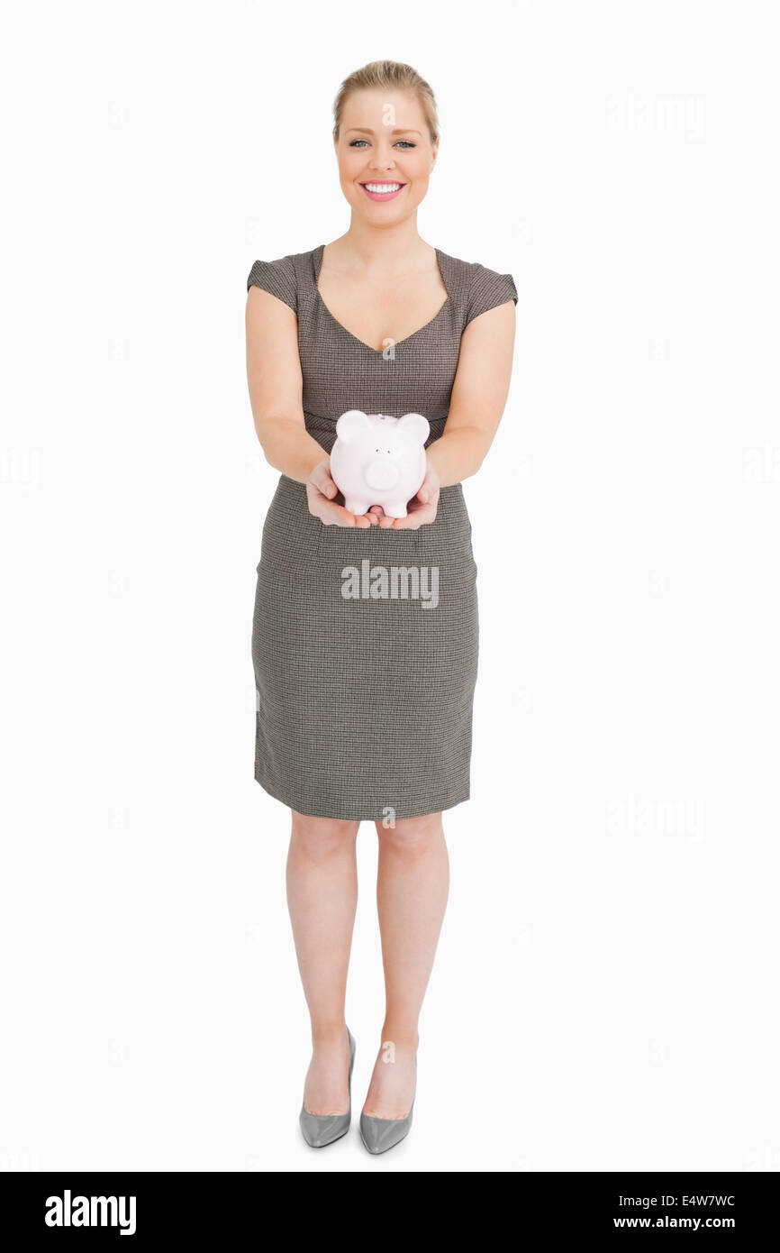 Woman holding a piggy bank Stock Photo - Alamy