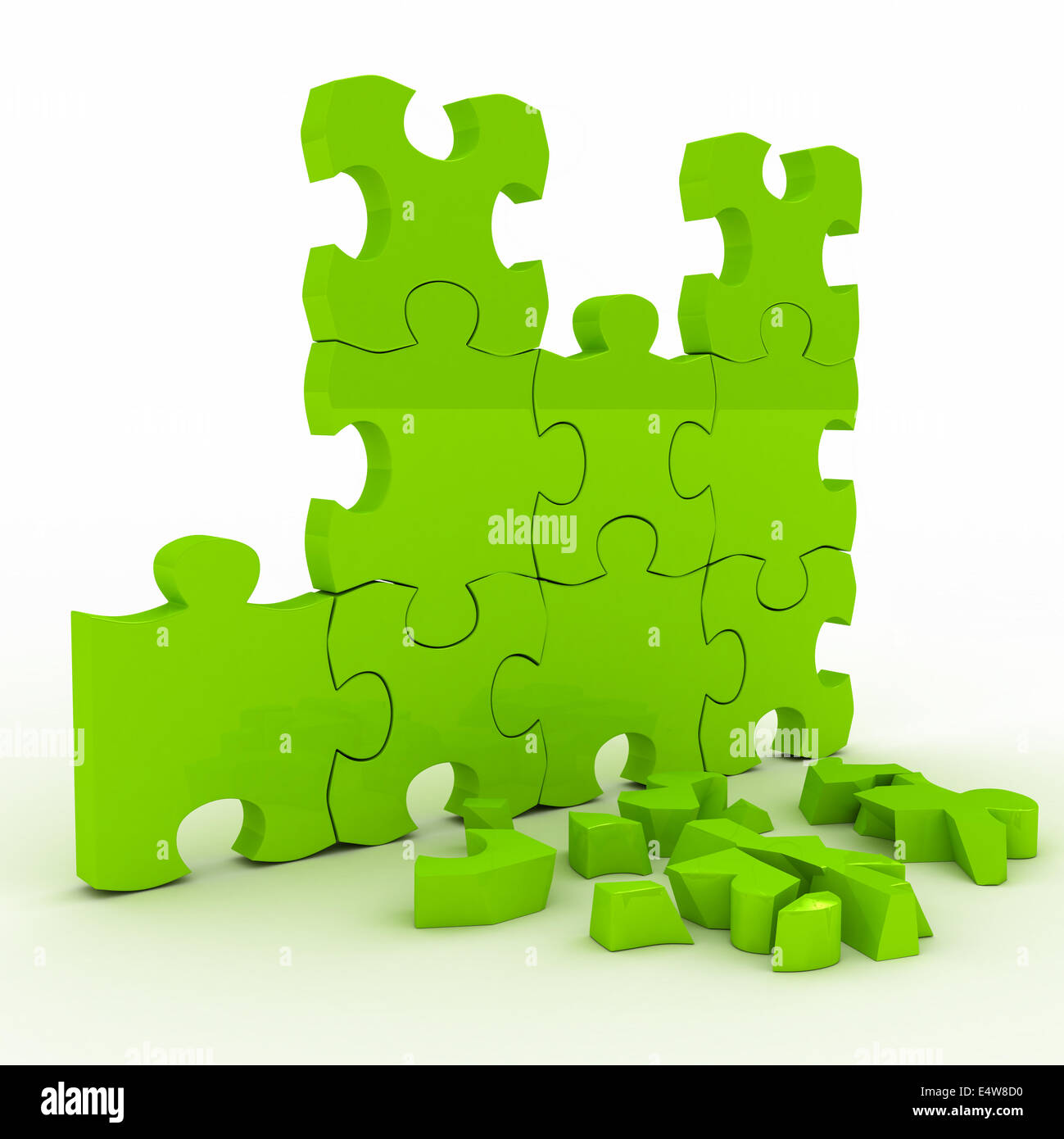 Green brocken puzzle over white Stock Photo