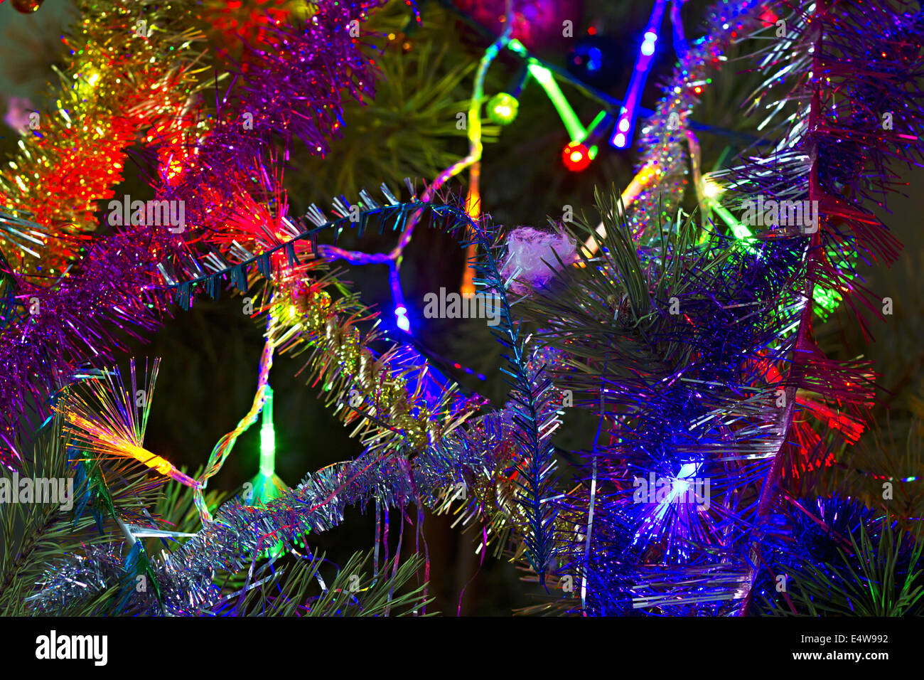 Christmas background of tinsel and garland Stock Photo Alamy