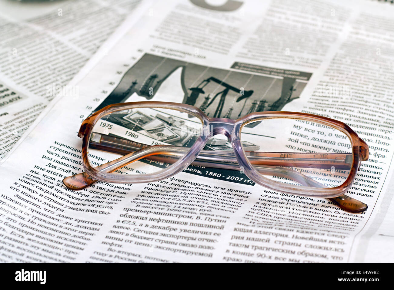 reading glasses lying on the paper Stock Photo Alamy