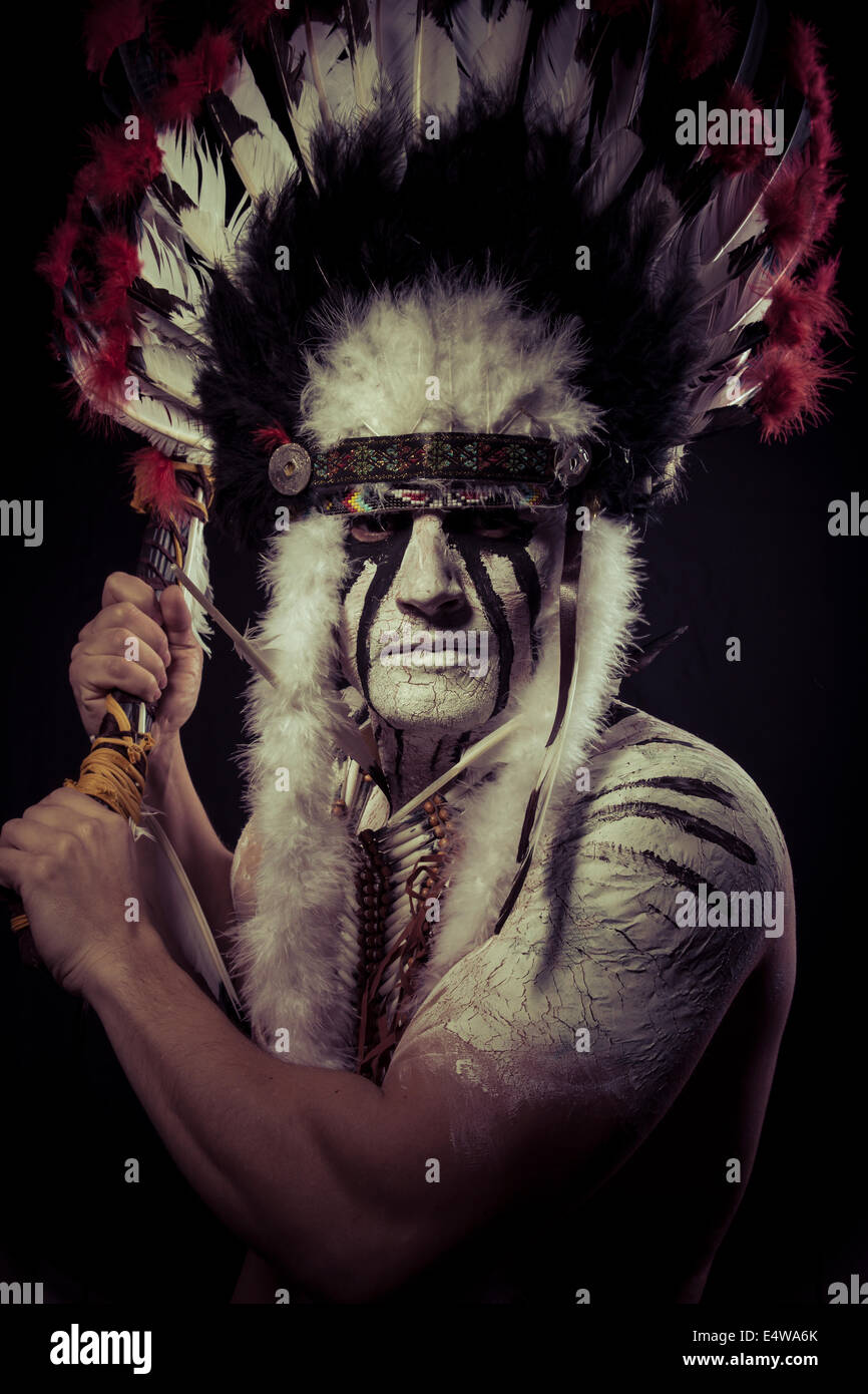 Native, American Indian chief with big feather headdress Stock Photo ...