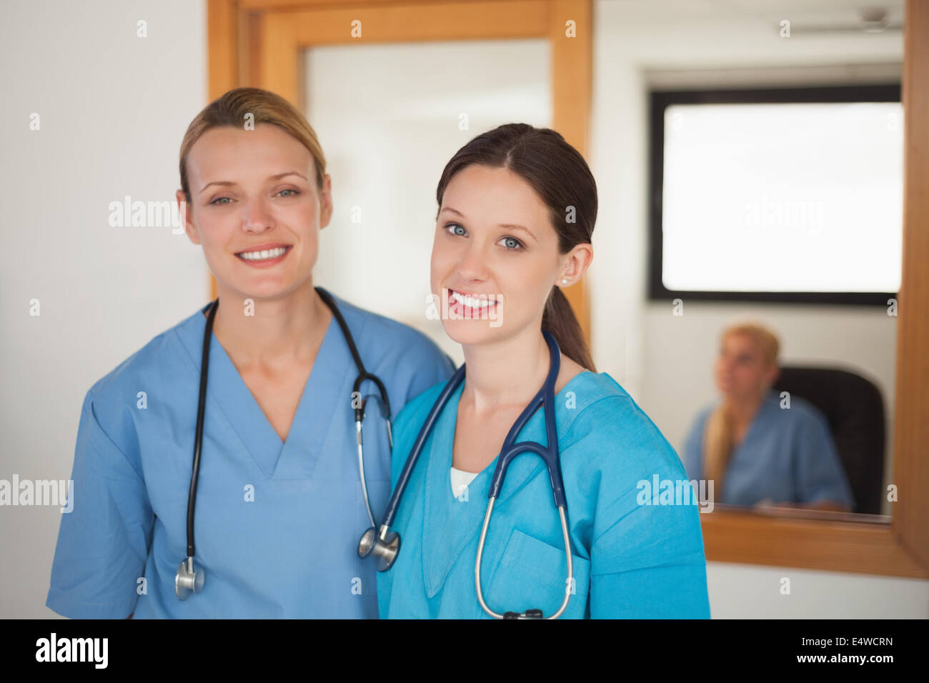 Nurses looking at camera Stock Photo - Alamy