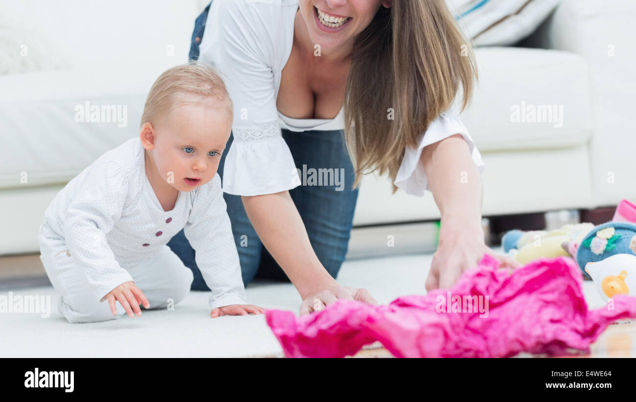 Baby and a mother on all fours Stock Photo Alamy