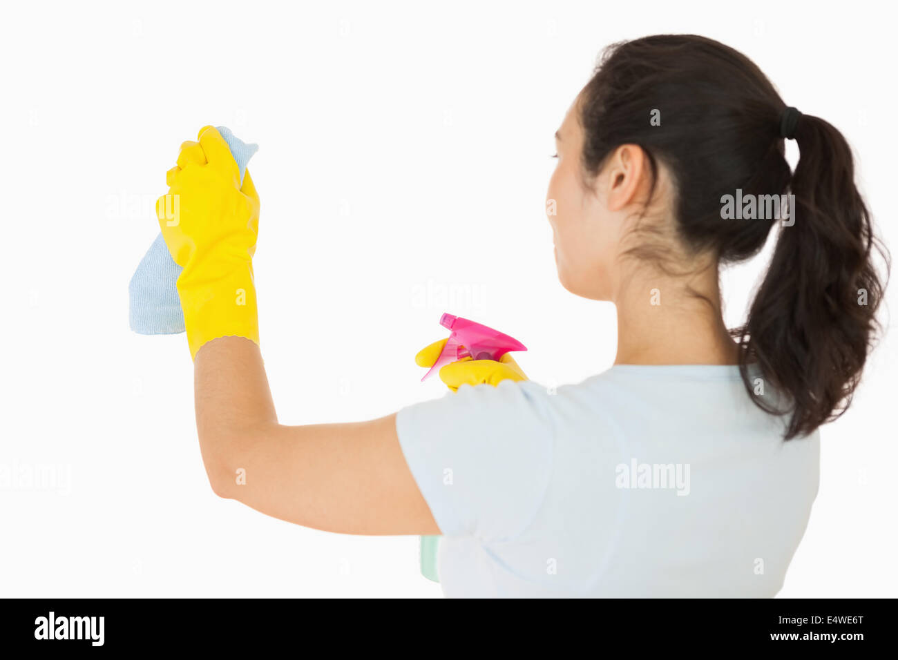 Woman cleaning white walls Stock Photo Alamy