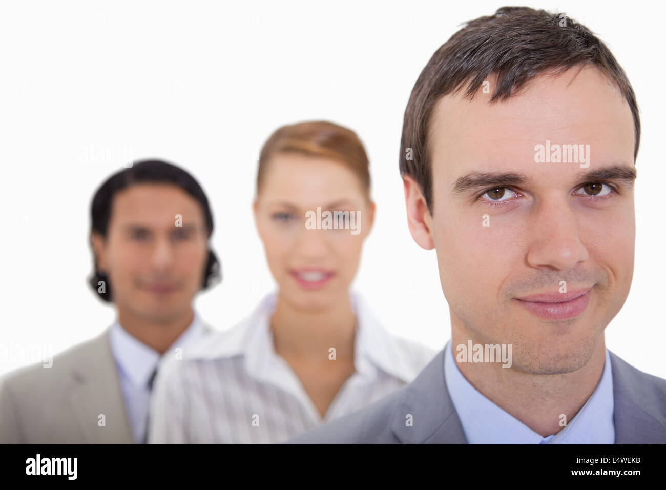 Businessteam standing in a row Stock Photo - Alamy