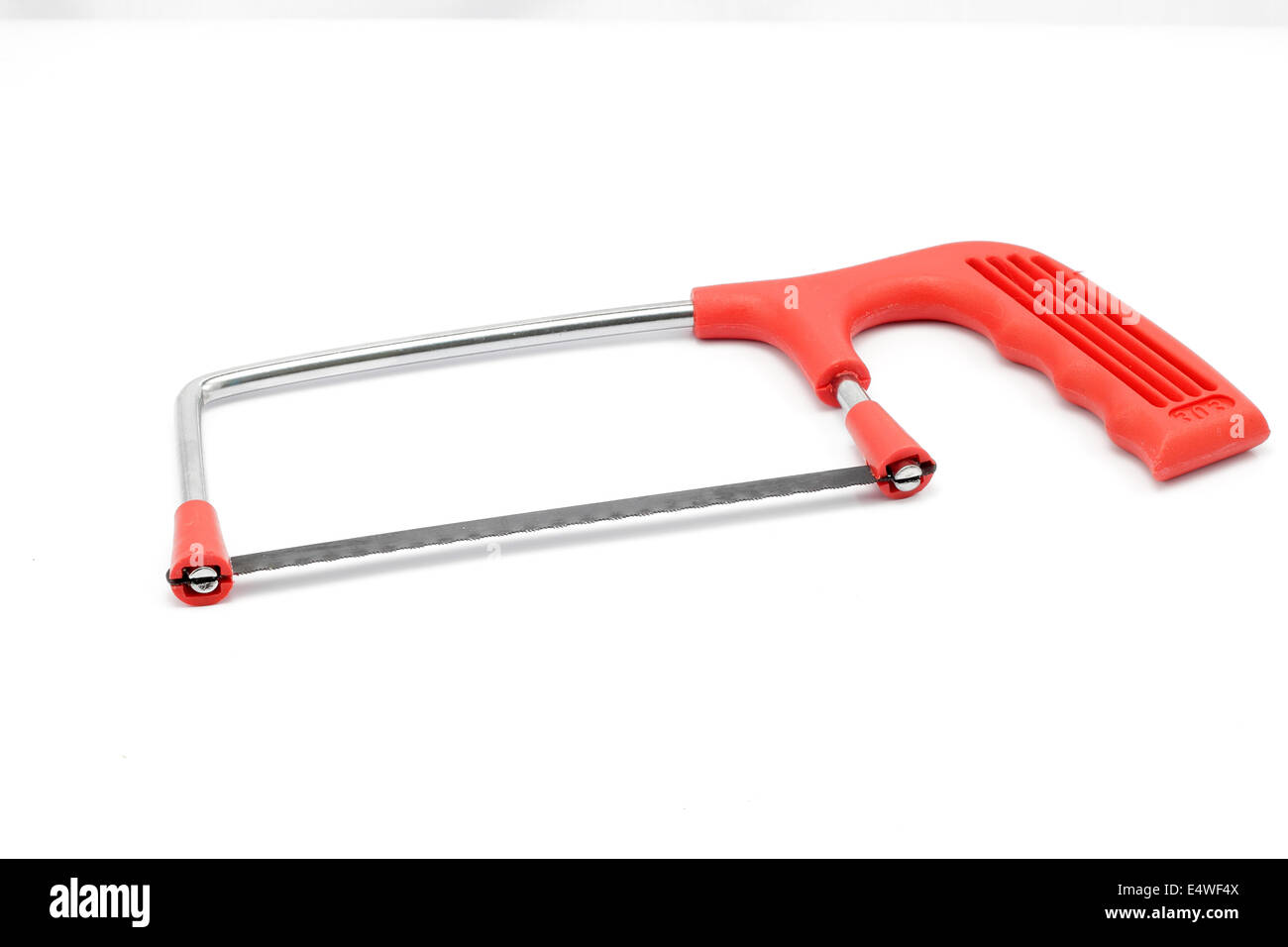 Red handle saw in white isolated background Stock Photo