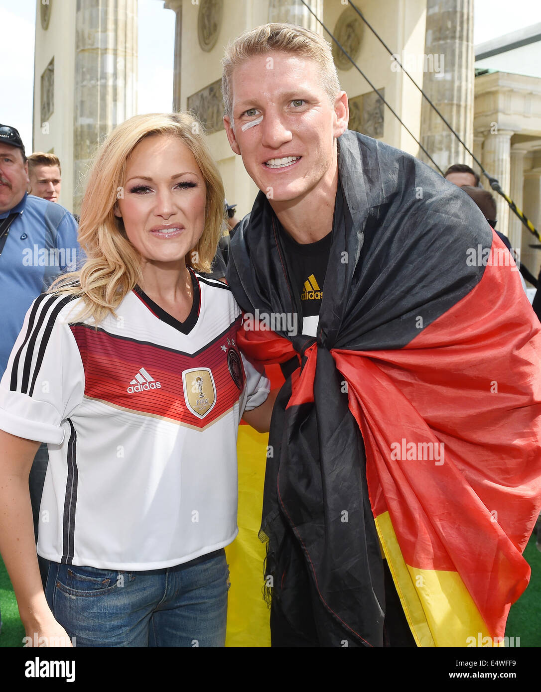 Singer Helene Fischer and Germany's Bastian Schweinsteiger during the World  Cup party after team German arrived back in German in front of the  Brandenburg Gate in Berlin, Germany, 15 July 2014. The