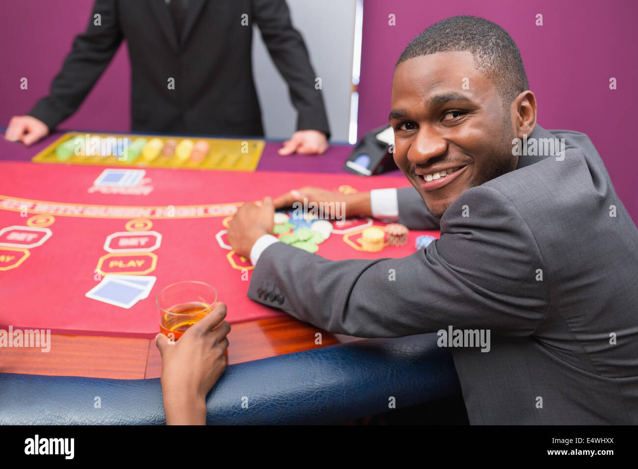 Happy man taking his winnings Stock Photo