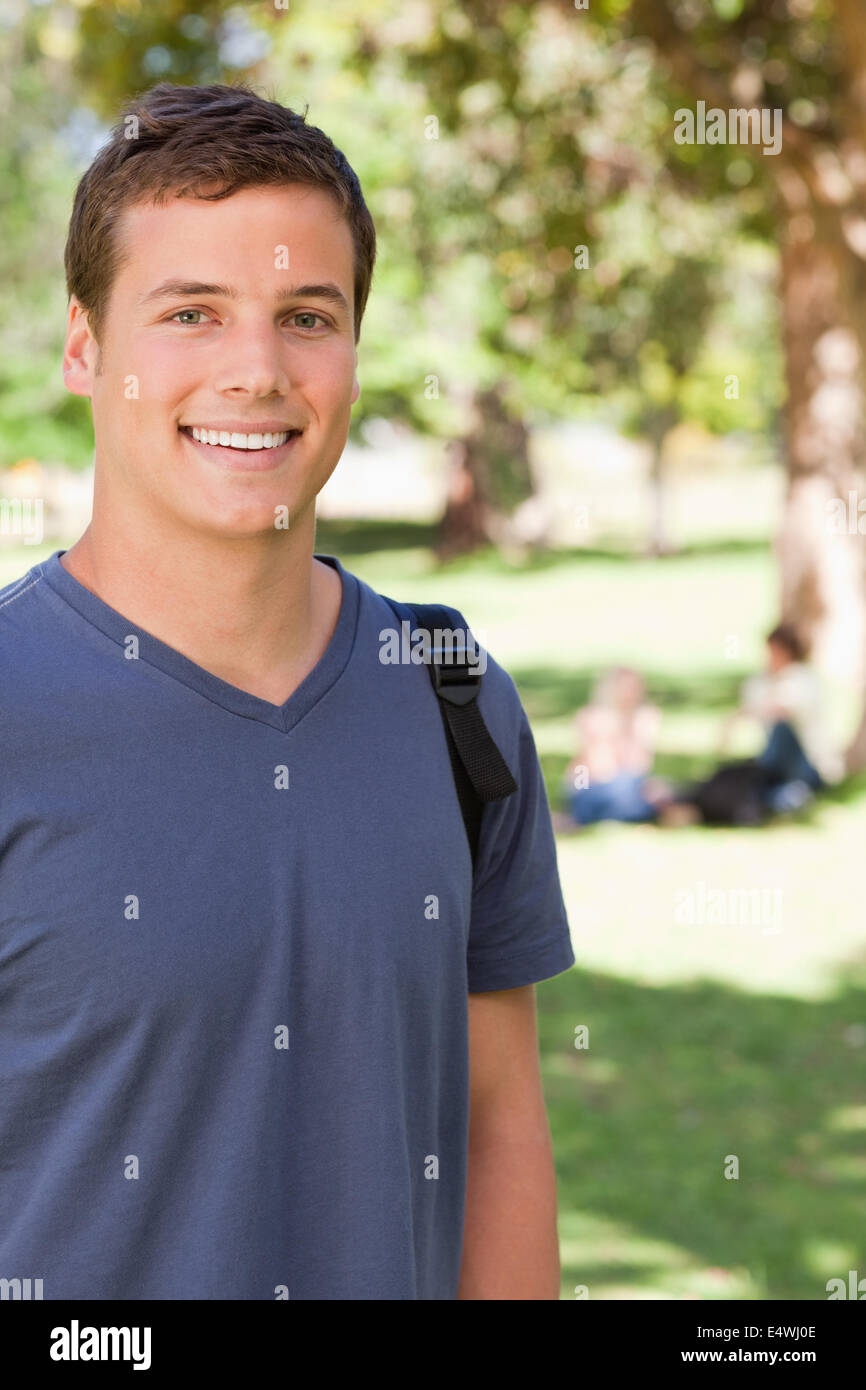 Portrait of a male student smiling Stock Photo - Alamy