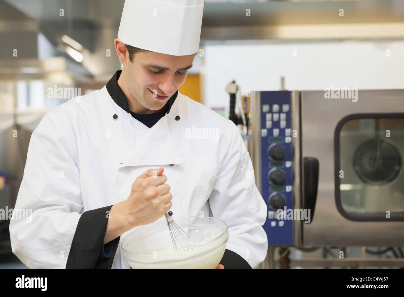 Smiling male chef mixing hi-res stock photography and images - Alamy