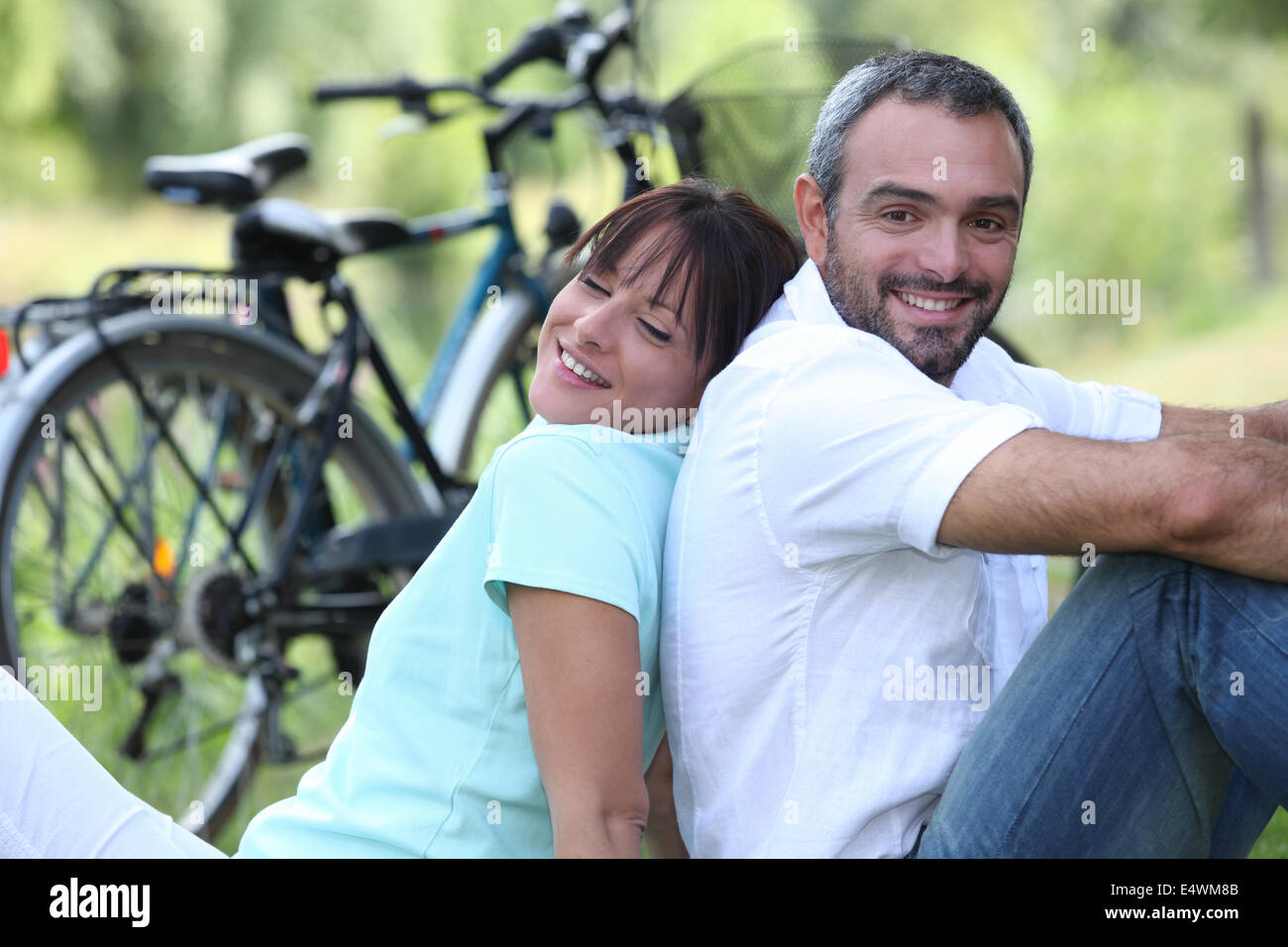 Couple On Bike Ride Stock Photo Alamy