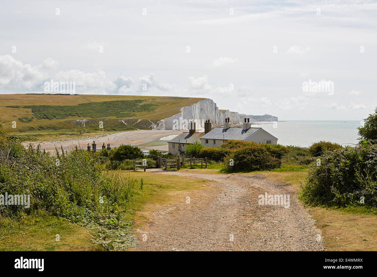 Cuckmere Haven and the Seven Sisters to the Bell Tout lighthouse viewed from the coast guard cottages Stock Photo