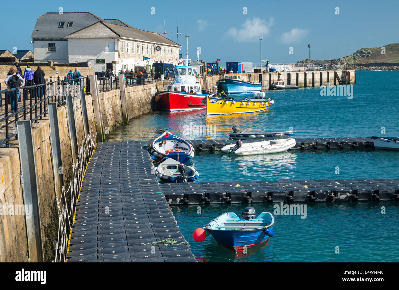 Hughtown Harbour at St. Mary's on the Isles of Scilly, Cornwall, UK with moored boats on a sunny day Stock Photo