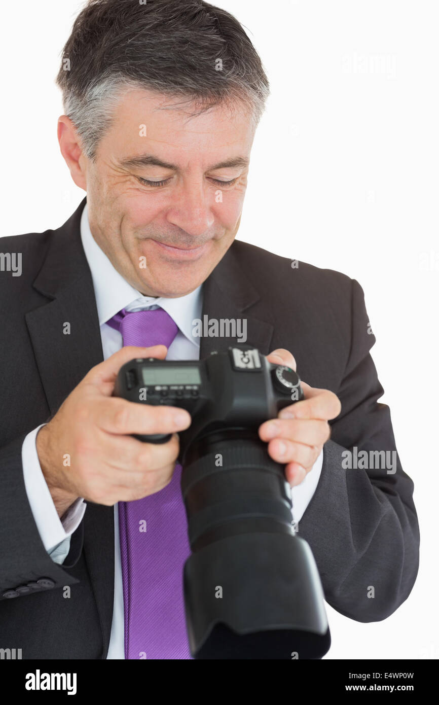 Businessman smiling at the camera Stock Photo - Alamy