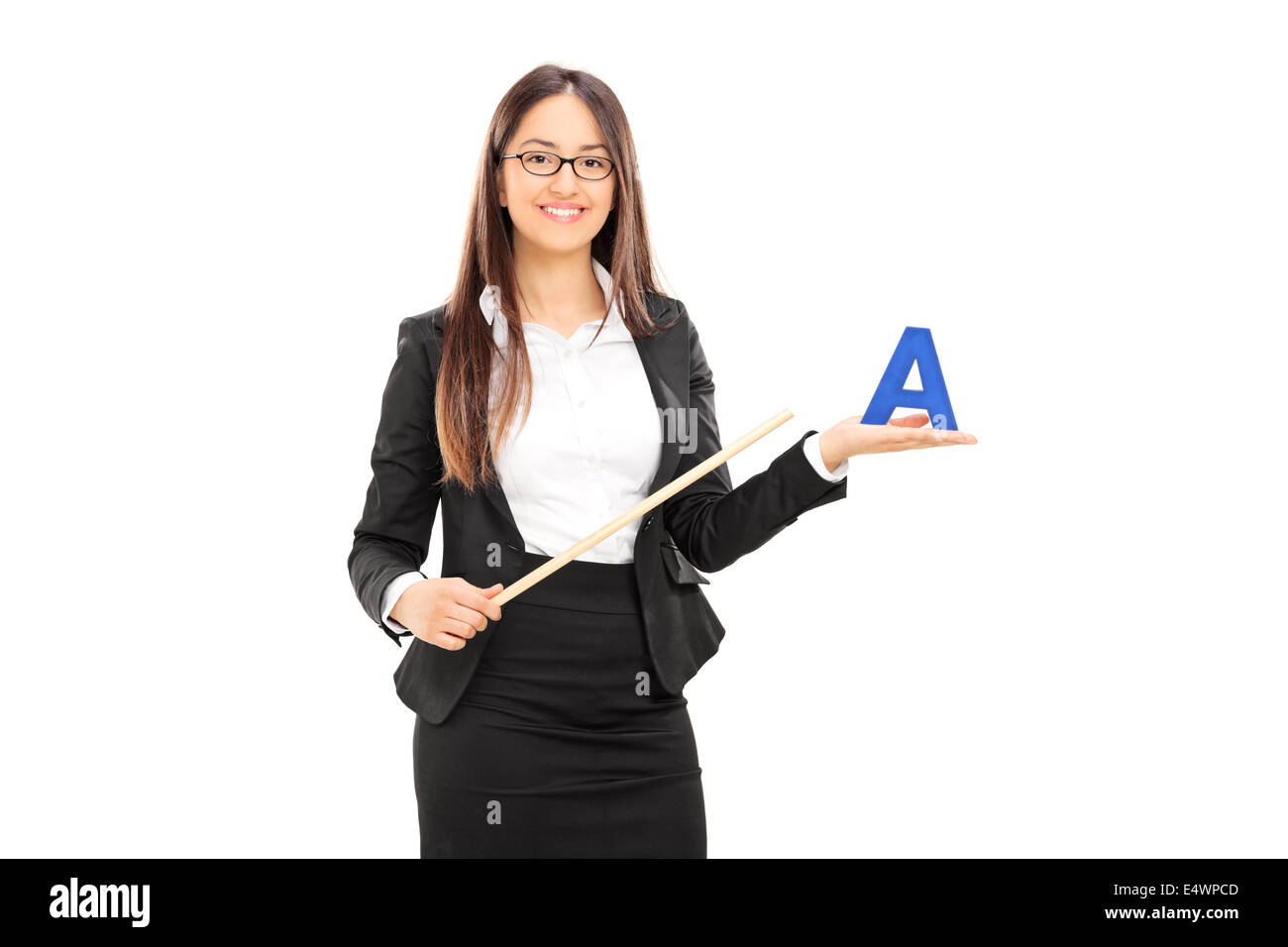 Female teacher holding a stick and a letter Stock Photo