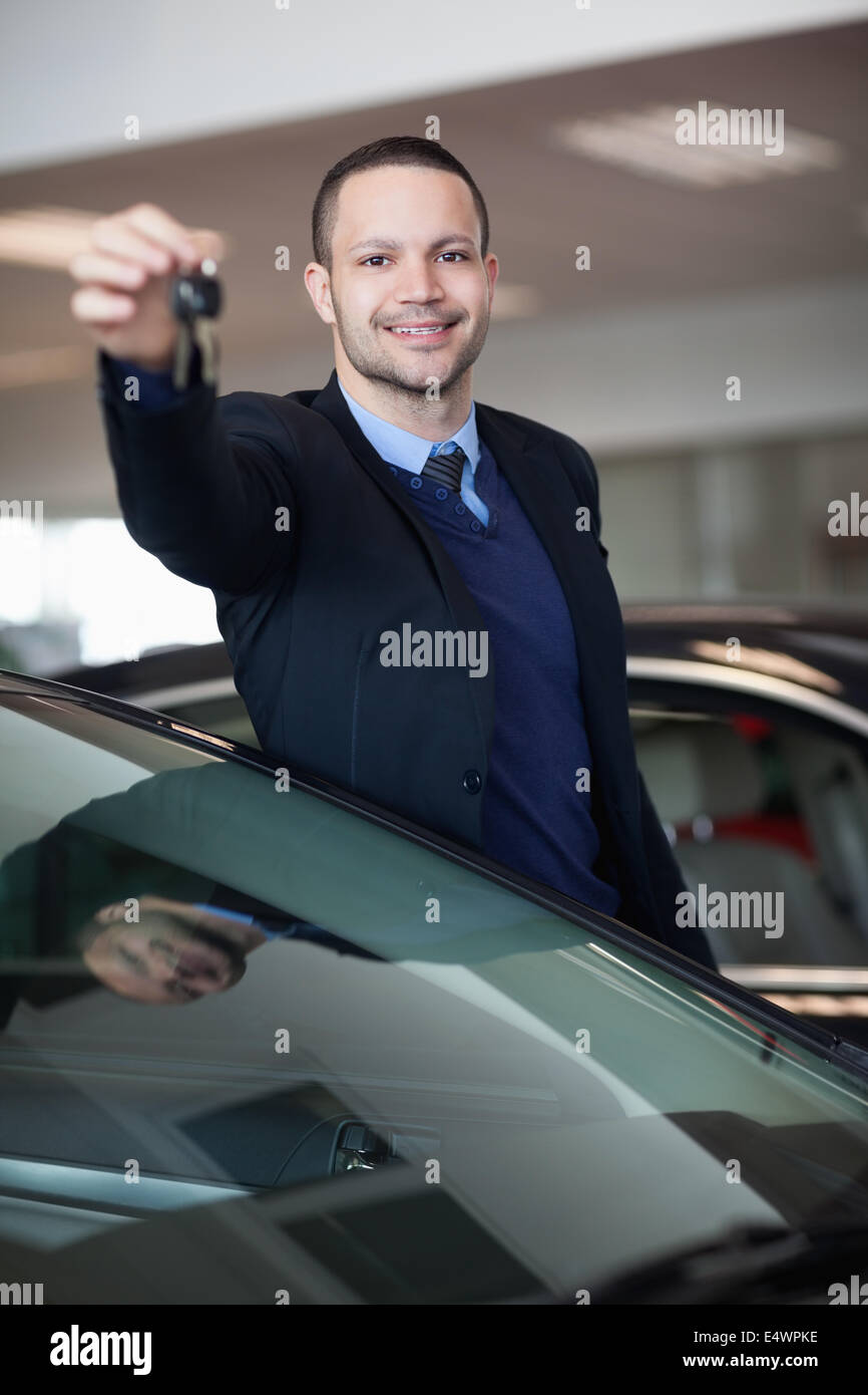 Dealer holding car keys Stock Photo Alamy